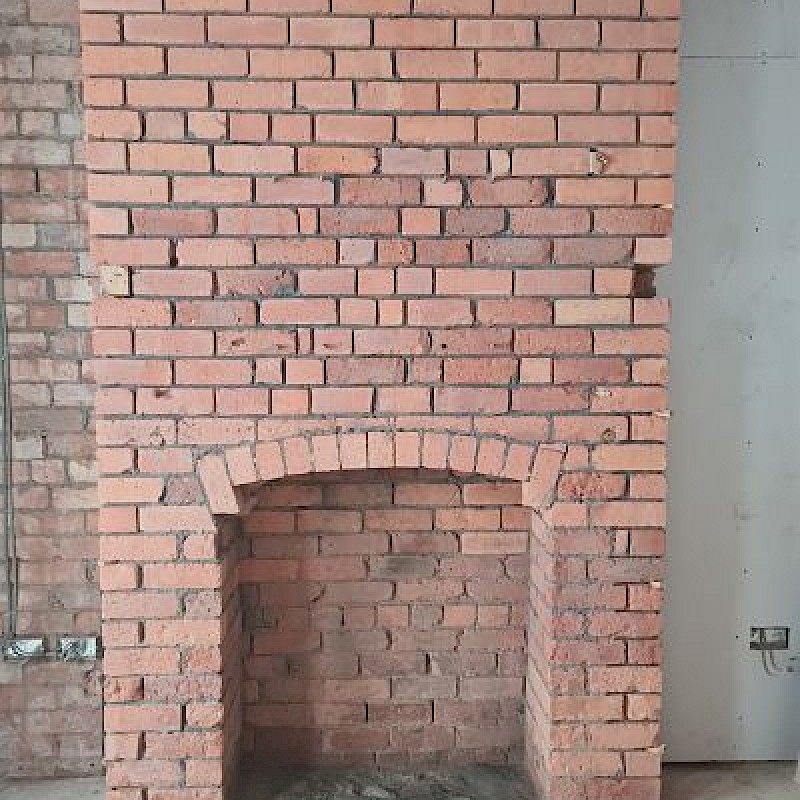 After sandblasting brick fireplace.